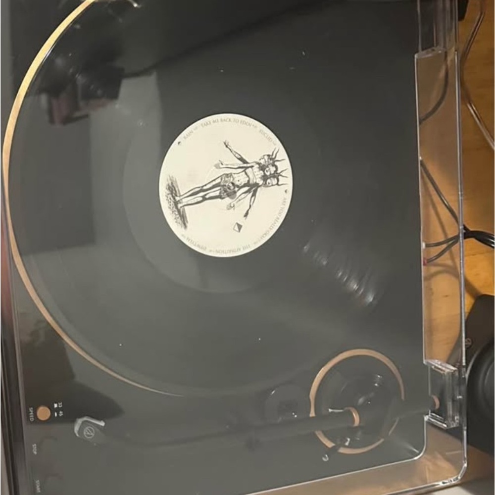 Audio Technica Black Turntable with Gold Accents